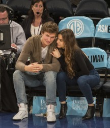 Ansel Elgort and his girlfriend, Violetta Komyshan sit courtside as the Knicks defeat the Minnesota Timberwolves in New York. 12/02/20